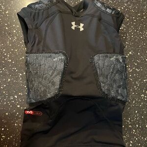 UA Youth small padded under shirt. Great for football!
